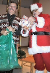 Tom and Santa giving gifts.
